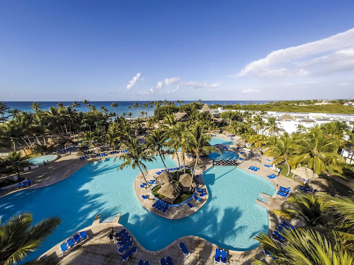 Be Live Collection Canoa all-inclusive beachfront resort with palm-lined beach in Bayahibe, Dominican Republic.