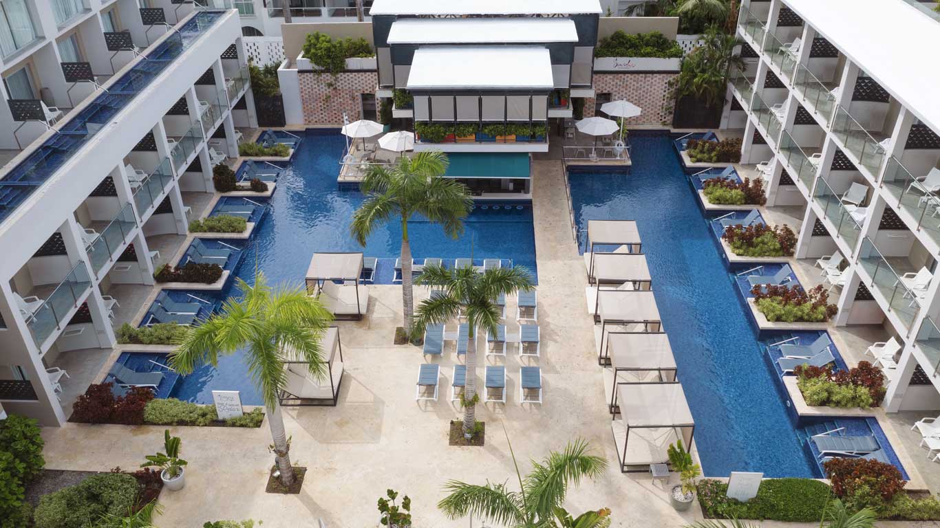 Catalonia Royal La Romana adults-only all-inclusive resort with beachfront infinity pool in the Dominican Republic.