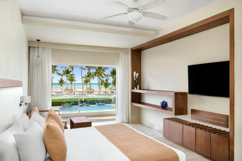 Sun Club Junior Suite Ocean Front with king bed and direct ocean view terrace at Sunscape Dominicus La Romana.