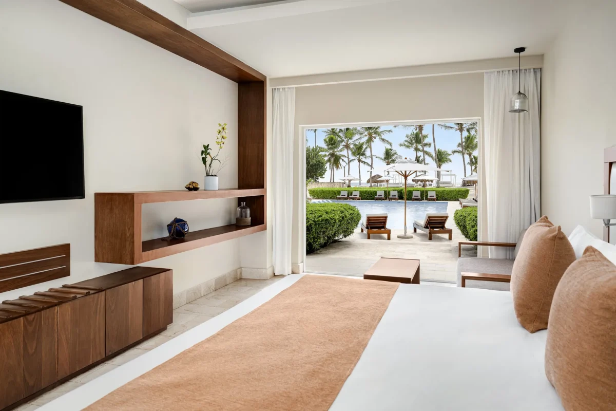 Sun Club Junior Suite Pool Access with king bed and direct terrace access to pool and ocean views at Sunscape Dominicus La Romana.