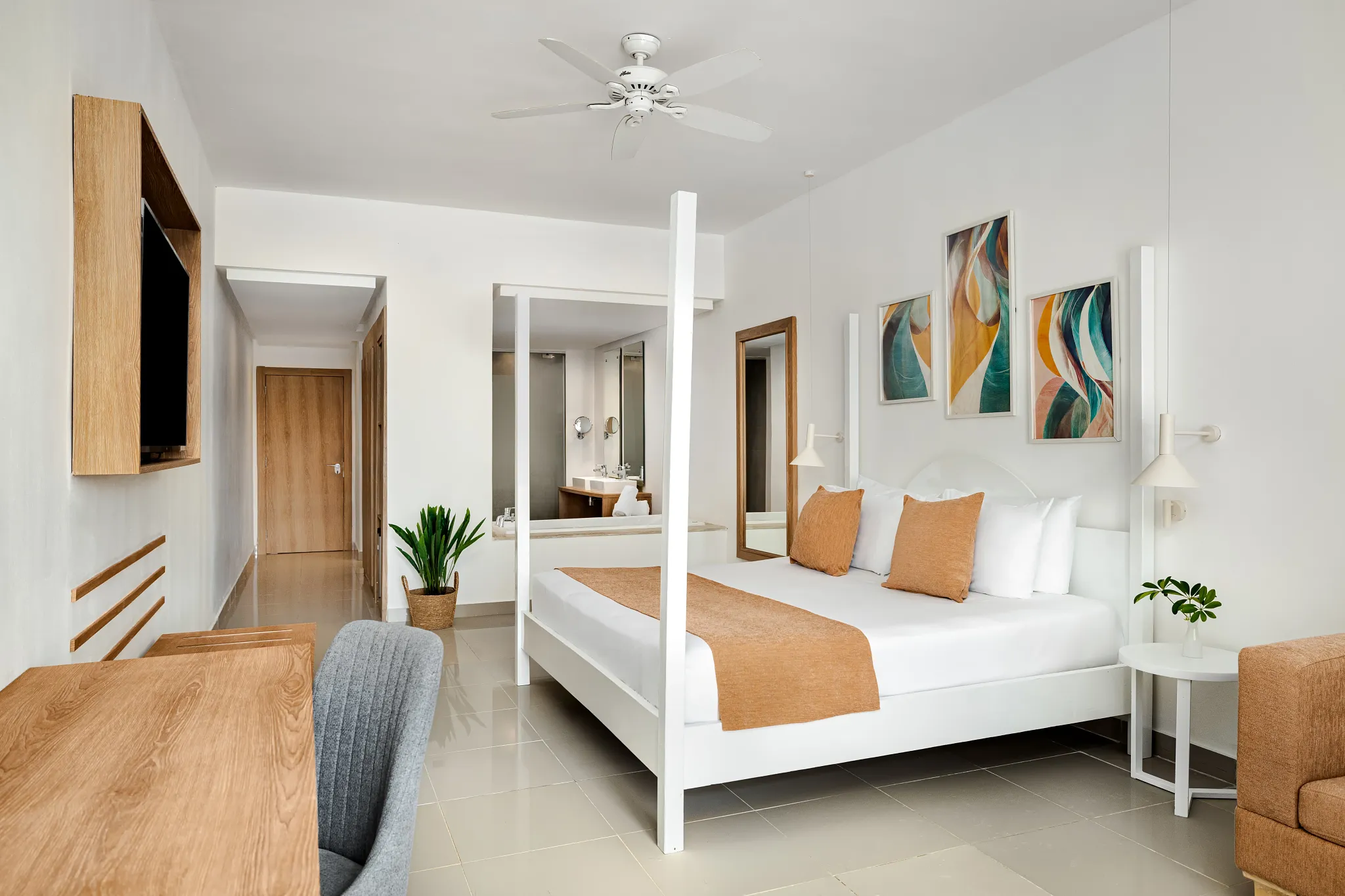 Sun Club Superior Swim Out Ocean View king room with canopy bed and modern décor at Sunscape Dominicus La Romana.